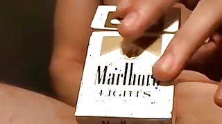 Naughty Bryce Corbin chain smokes cigars and masturbates